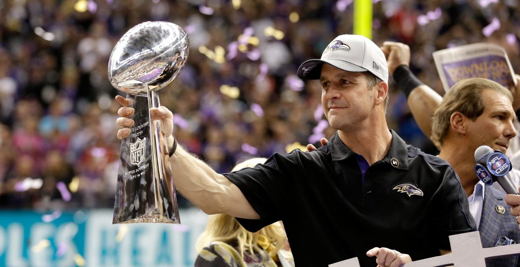 NEW ORLEANS, LA - FEBRUARY 03: Head coach John Harbaugh of the Baltimore Ravens celebrates with the VInce Lombardi Championship trophy after the Ravens won 34-31 against the San Francisco 49ers during Super Bowl XLVII at the Mercedes-Benz Superdome on February 3, 2013 in New Orleans, Louisiana.