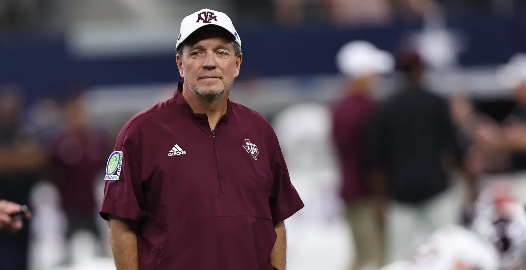 ARLINGTON, TX - SEPTEMBER 30: Aggies head coach Jimbo Fisher watches his team warm up before the Southwest Classic between the Arkansas Razorbacks and the Texas A&M Aggies on September 30, 2023 at AT&T Stadium in Arlington, TX