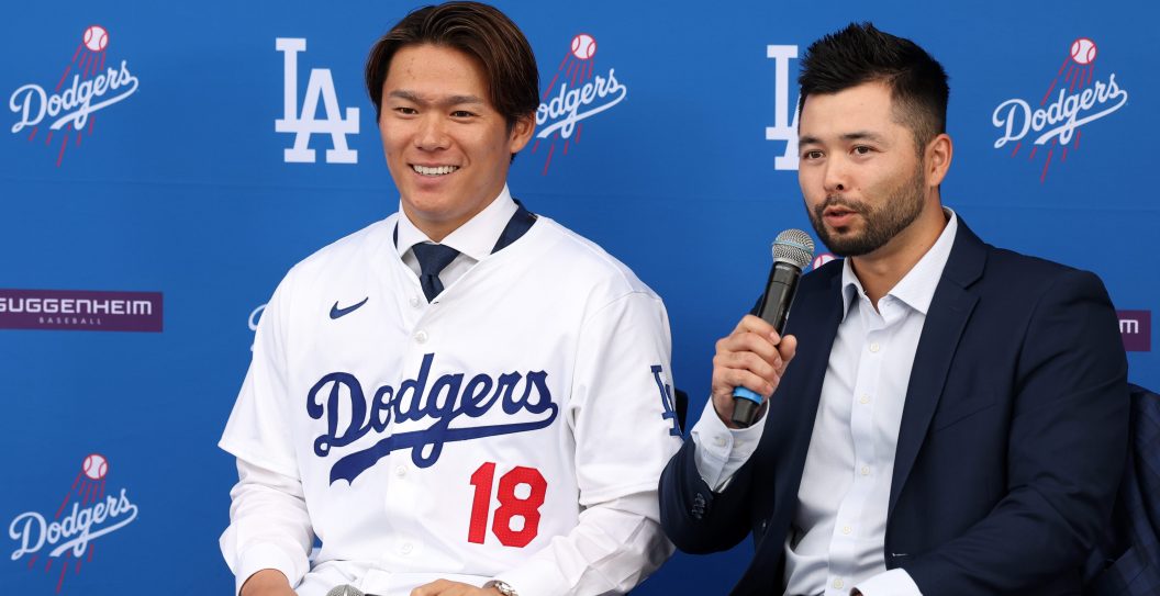 LOS ANGELES, CA - DECEMBER 27: Newly acquired Los Angeles Dodgers pitcher Yoshinobu Yamamoto (18) smiles during a press conference on December 27, 2023 at Dodger Stadium in Los Angeles, CA.
