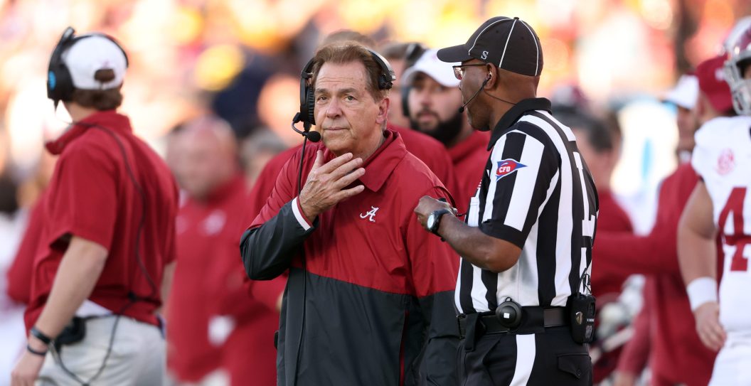 PASADENA, CALIFORNIA - JANUARY 01: Head coach Nick Saban of the Alabama Crimson Tide meets with an official in the second quarter against the Michigan Wolverines during the CFP Semifinal Rose Bowl Game at Rose Bowl Stadium on January 01, 2024 in Pasadena, California.