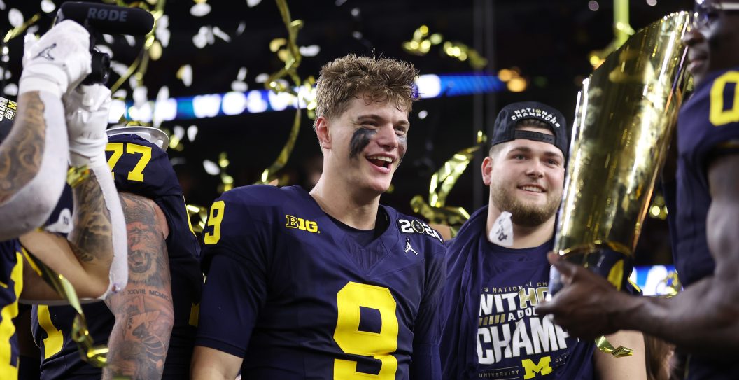 HOUSTON, TEXAS - JANUARY 08: J.J. McCarthy #9 of the Michigan Wolverines celebrates after defeating the Washington Huskies during the 2024 CFP National Championship game at NRG Stadium on January 08, 2024 in Houston, Texas. Michigan defeated Washington 34-13.