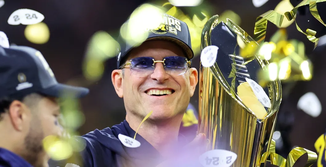 HOUSTON, TEXAS - JANUARY 08: Head coach Jim Harbaugh of the Michigan Wolverines celebrates after defeating the Washington Huskies during the 2024 CFP National Championship game at NRG Stadium on January 08, 2024 in Houston, Texas. Michigan defeated Washington 34-