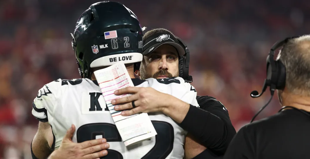 TAMPA, FL - JANUARY 15: Jason Kelce #62 of the Philadelphia Eagles hugs head coach Nick Sirianni during the fourth quarter of an NFL wild-card playoff football game against the Tampa Bay Buccaneers at Raymond James Stadium on January 15, 2024 in Tampa, Florida.