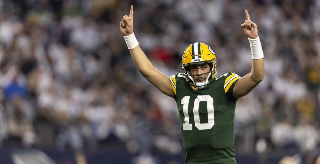 ARLINGTON, TEXAS - JANUARY 14: Jordan Love #10 of the Green Bay Packers celebrates after a touchdown during an NFL wild-card playoff football game between the Dallas Cowboys and the Green Bay Packers at AT&T Stadium on January 14, 2024 in Arlington, Texas.