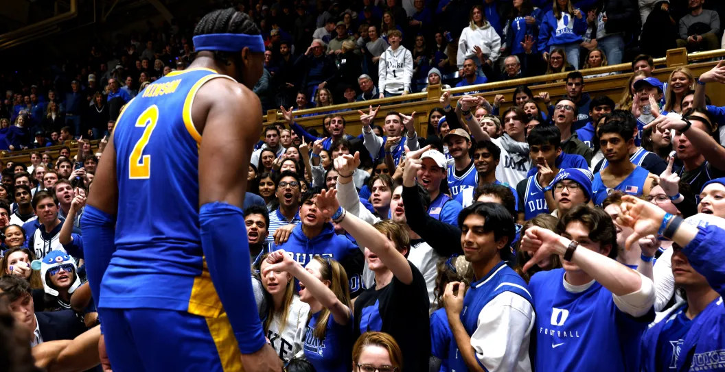 DURHAM, NORTH CAROLINA - JANUARY 20: The Cameron Crazies react as Blake Hinson #2 of the Pittsburgh Panthers celebrates following their 80-76 win against the Duke Blue Devils at Cameron Indoor Stadium on January 20, 2024 in Durham, North