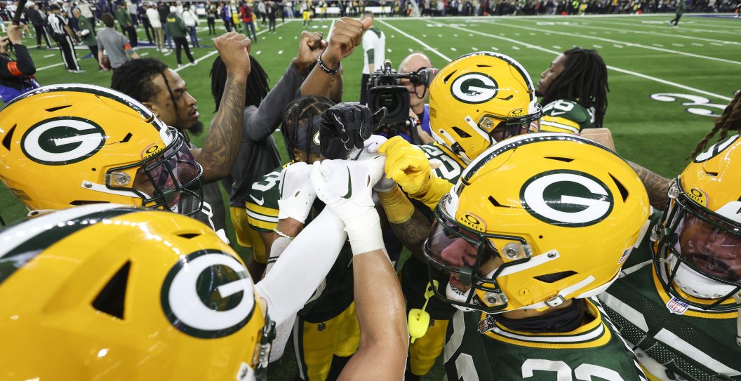ARLINGTON, TX - JANUARY 14: Jaire Alexander #23 of the Green Bay Packers leads a huddle prior to an NFL wild-card playoff football game against the Dallas Cowboys at AT&T Stadium on January 14, 2024 in Arlington, Texas.
