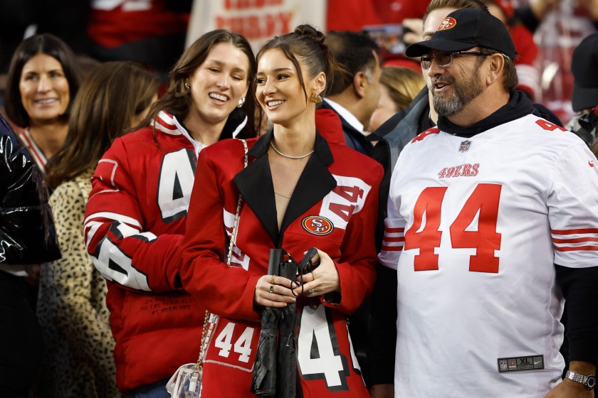 Kristin Juszczyk smiles in the stands at a 49ers game.