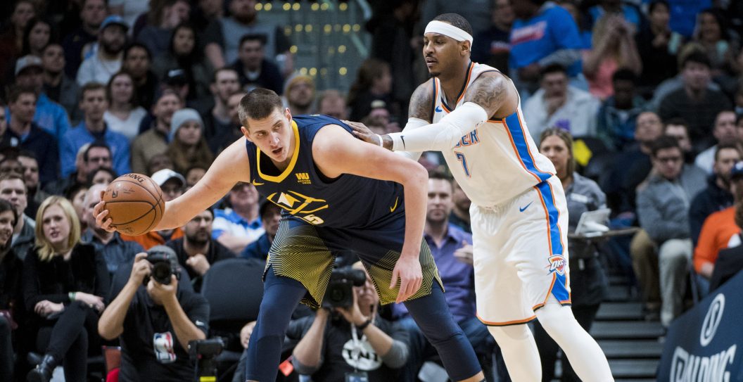 DENVER, CO - FEBRUARY 01: Nikola Jokic #15 of the Denver Nuggets looks for an open teammate against the Oklahoma City Thunder at Pepsi Center on February 1, 2018 in Denver, Colorado. NOTE TO USER: User expressly acknowledges and agrees that, by downloading and or using this photograph, User is consenting to the terms and conditions of the Getty Images License Agreement.