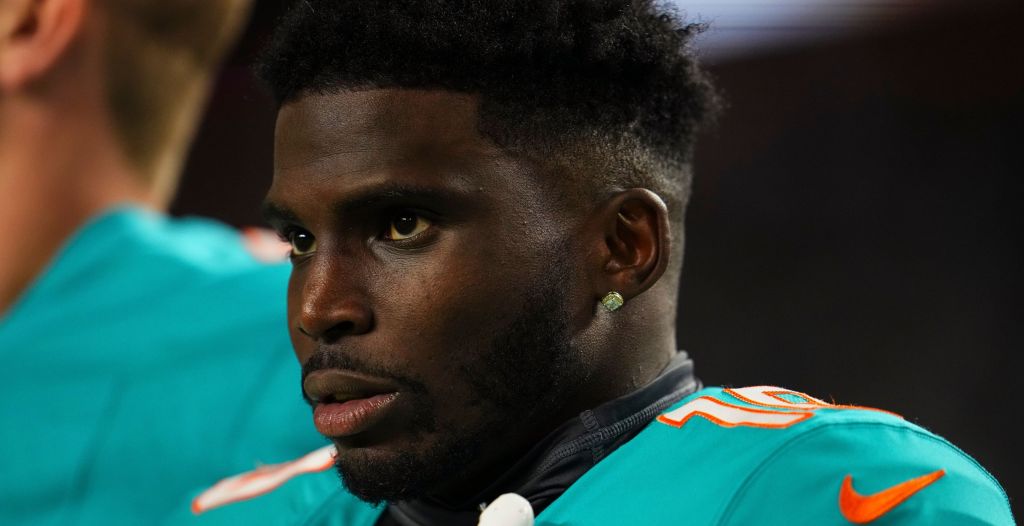 Tyreek Hill looks on during a Dolphins game.