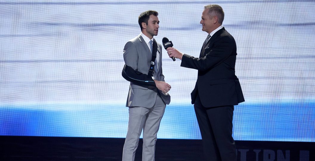 NASHVILLE, TENNESSEE - NOVEMBER 30: Host Marty Snider (R) interviews 2023 National Motorsports Press Association (NMPA) Most Popular Driver Award presented by Hooters winner, Chase Elliott onstage during the NASCAR Awards and Champion Celebration at the Music City Center on November 30, 2023 in Nashville, Tennessee.
