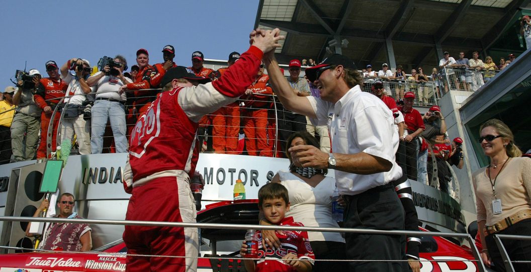 INDIANAPOLIS - AUGUST 4: Bill Elliott, driver of the #9 Evernham Motorsports Dodge intrepid RT, high fives his car owner Ray Evernham after winning the NASCAR Winston Cup Brickyard 400 on August 4, 2002 during at Indianapolis Motor Speedway in Indianapolis, Indiana.