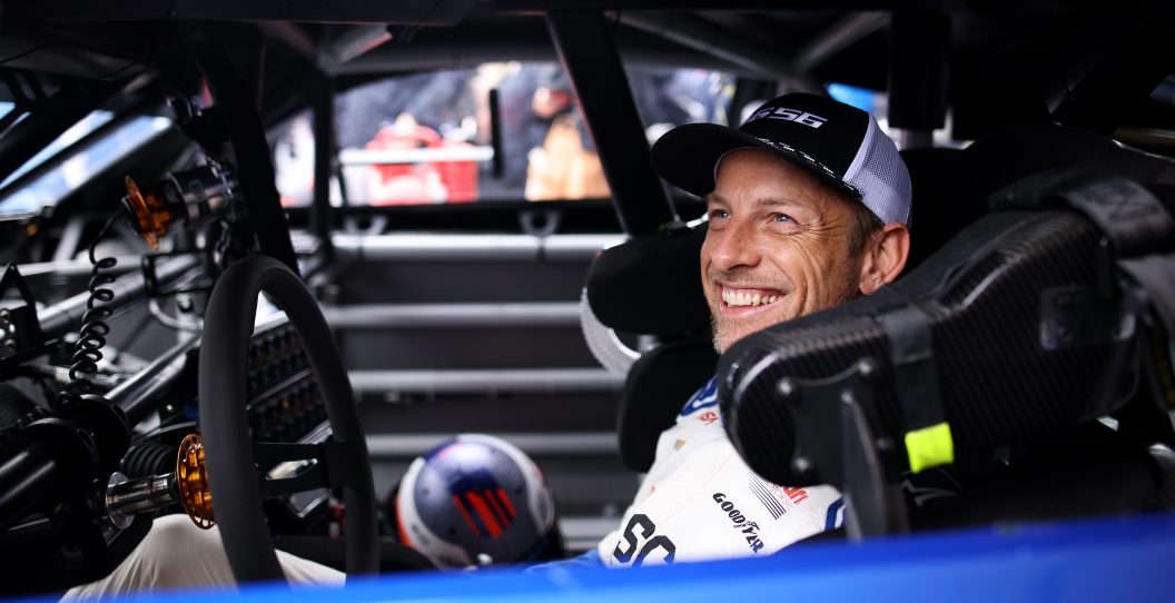 CHICHESTER, ENGLAND - JULY 14: Jenson Button prepares to drive the NASCAR Garage 56 car up the 1.16 mile hill climb during Day Two of the Goodwood Festival of Speed at Goodwood on July 14, 2023 in Chichester, England.