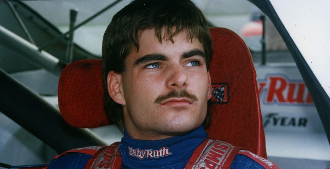 RICHMOND, VA — September 11, 1992: Jeff Gordon awaits the start of the Autolite 200 NASCAR Busch Grand National race at Richmond International Raceway. Gordon ran the full BGN schedule in Baby Ruth-sponsored Ford Thunderbirds owned by Bill Davis. Gordon won three times and sat on the pole for 11 events.