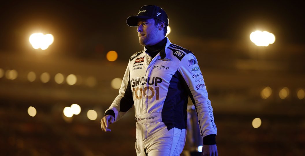 AVONDALE, ARIZONA - NOVEMBER 03: Marco Andretti, driver of the #7 Gainbridge Chevrolet, walks onstage during driver intros prior to the NASCAR Craftsman Truck Series Craftsman 150 at Phoenix Raceway on November 03, 2023 in Avondale, Arizona.