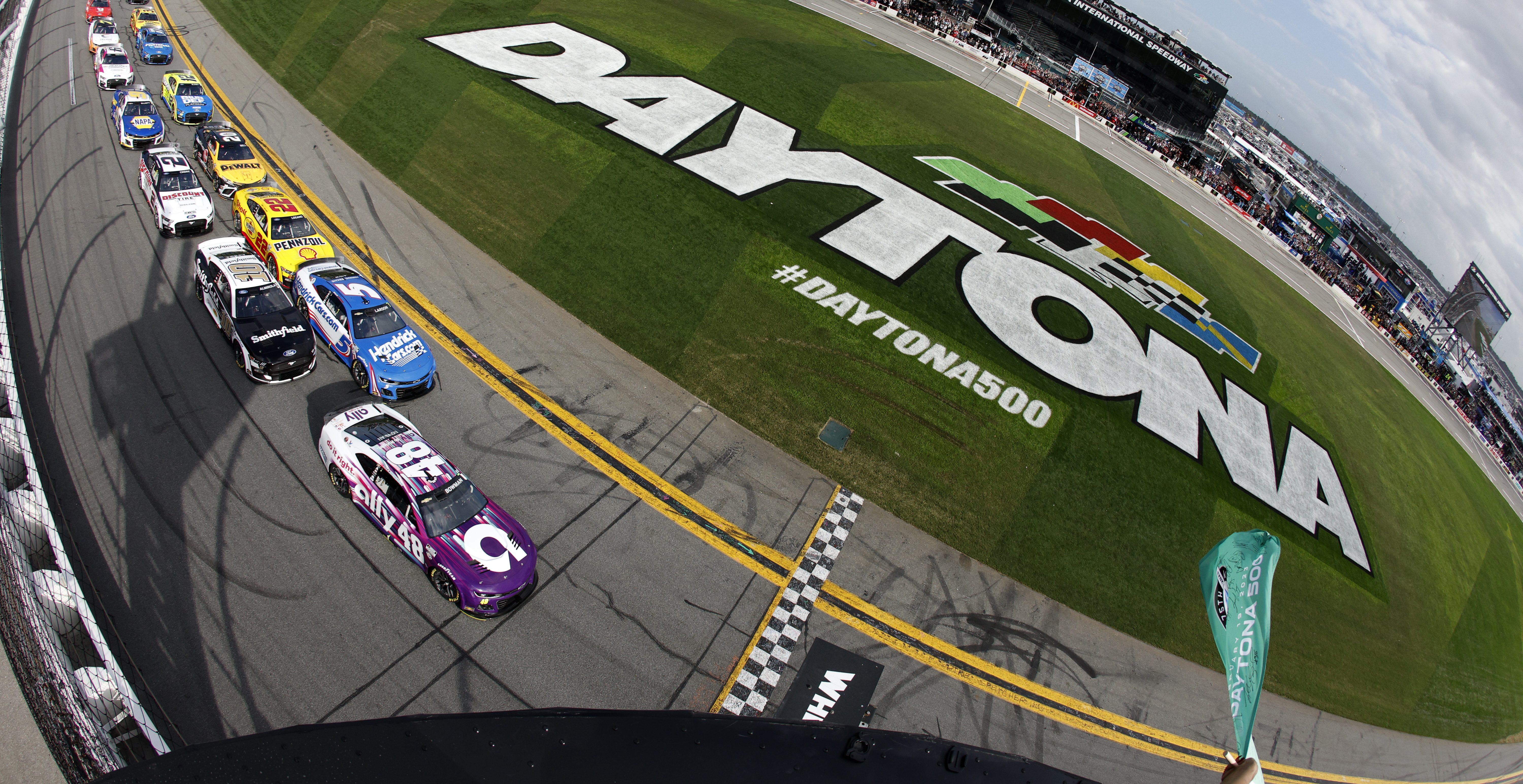 DAYTONA BEACH, FLORIDA - FEBRUARY 19: Alex Bowman, driver of the #48 Ally Chevrolet, leads the field to the green flag to start the NASCAR Cup Series 65th Annual Daytona 500 at Daytona International Speedway on February 19, 2023 in Daytona Beach, Florida.