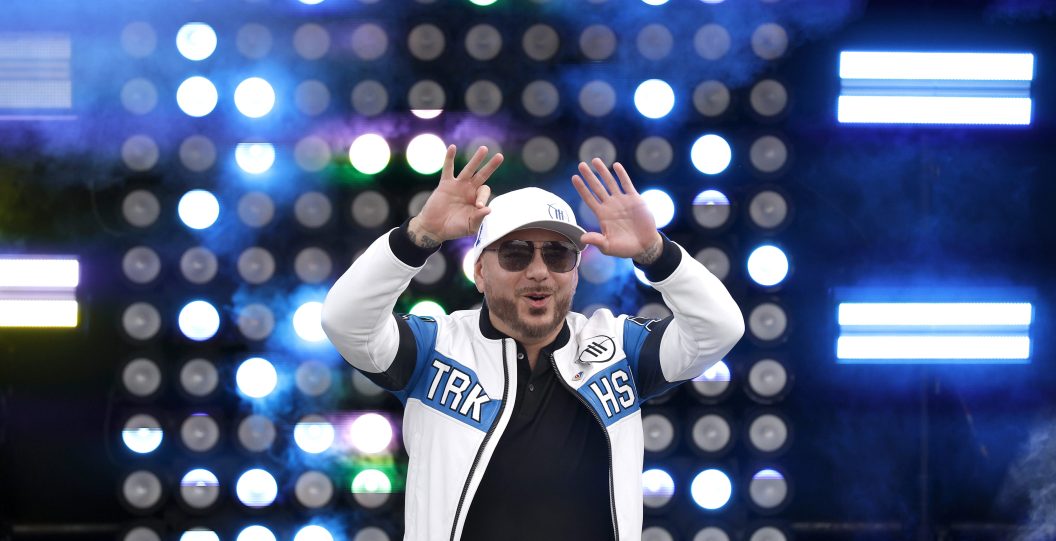 HOMESTEAD, FLORIDA - OCTOBER 22: Trackhouse Racing Team co-owner, Pitbull walks onstage during pre-race ceremonies prior to the NASCAR Cup Series 4EVER 400 Presented by Mobil 1 at Homestead-Miami Speedway on October 22, 2023 in Homestead, Florida.