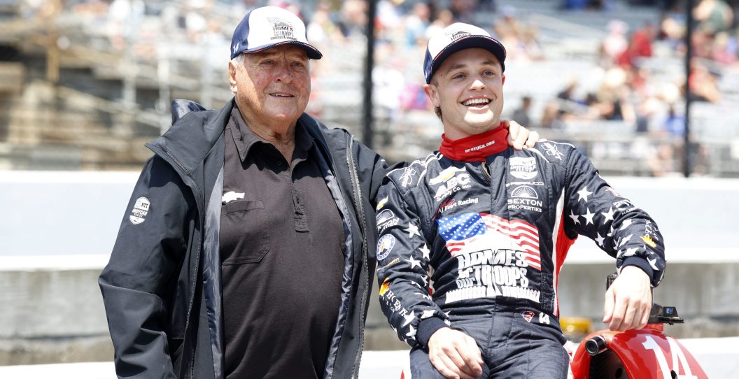 INDIANAPOLIS, IN - MAY 20: NTT IndyCar series driver Santino Ferrucci poses for a photo with car owner A.J. Foyt after qualifying in the top 12 for the 107th running of the Indianapolis 500 on May 20, 2023, at the Indianapolis Motor Speedway in Indianapolis, Indiana.