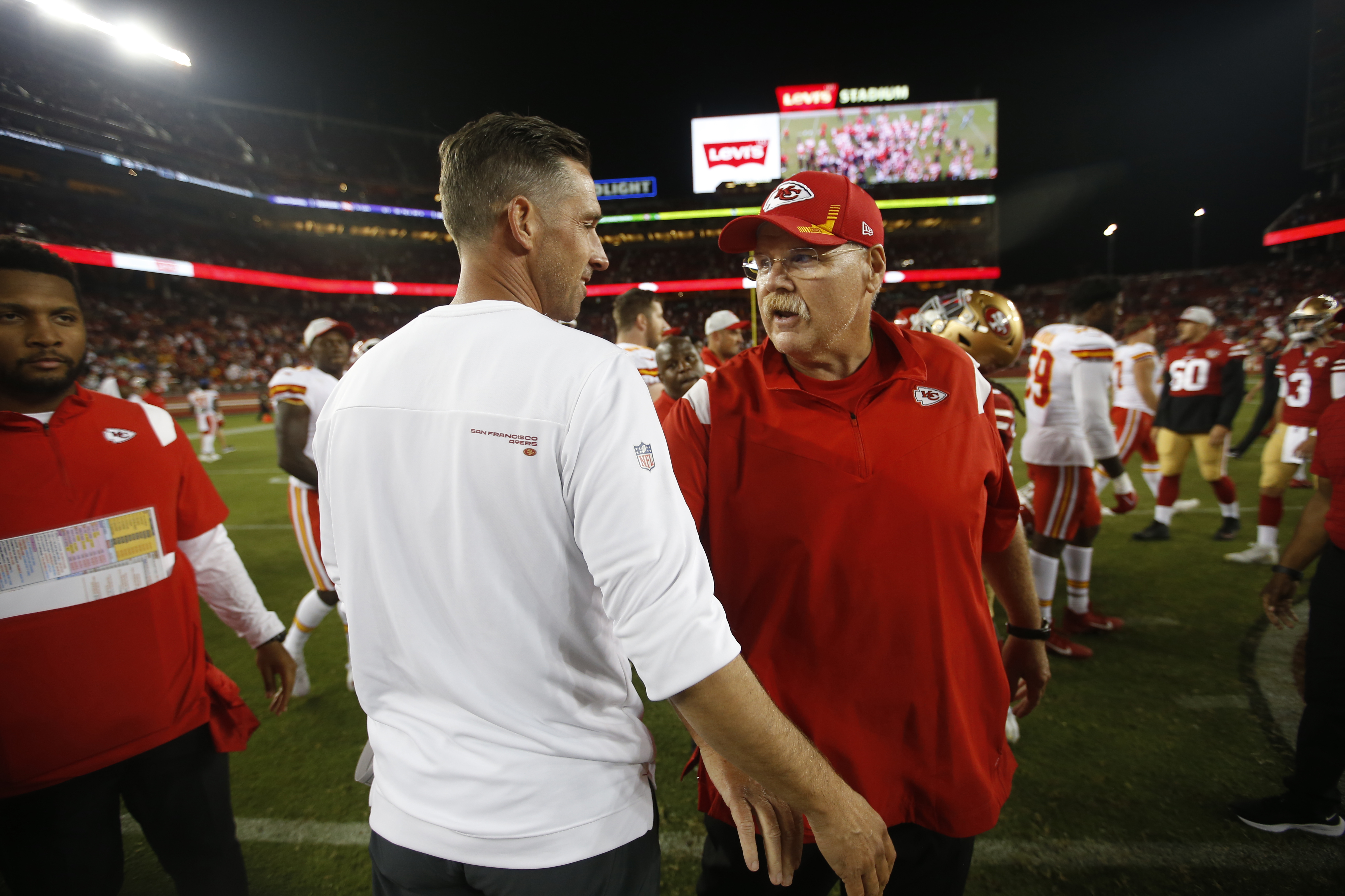 SANTA CLARA, CA - AUGUST 14: Head Coach Kyle Shanahan of the San Francisco 49ers and Head Coach Andy Reid of the Kansas City Chiefs shake hands on the field after the preseason game at Levi's Stadium on August 14, 2021 in Santa Clara, California. The Chiefs defeated the 49ers 19-16. 