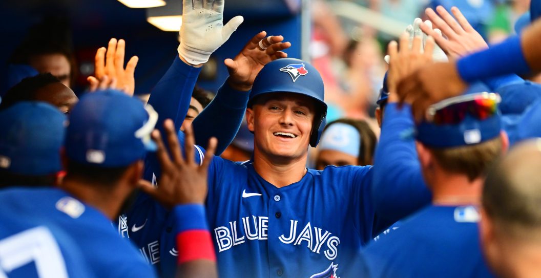 DUNEDIN, FLORIDA - APRIL 02: Matt Chapman #26 of the Toronto Blue Jays celebrates with teammates after hitting a home run in the fifth inning against the Philadelphia Phillies during a Grapefruit League spring training game at TD Ballpark on April 02, 2022 in Dunedin, Florida.
