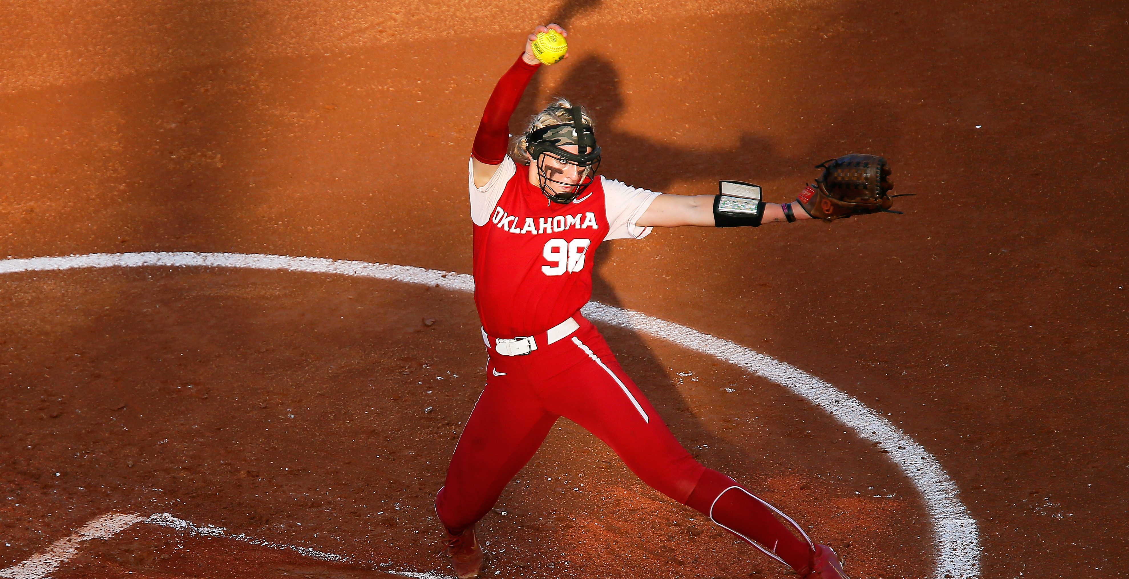 OKLAHOMA CITY, OK - JUNE 9: Pitcher Jordy Bahl #98 of the Oklahoma Sooners winds up against the Texas Longhorns in the first inning during the NCAA Women's College World Series finals at the USA Softball Hall of Fame Complex on June 9, 2022 in Oklahoma City, Oklahoma. Oklahoma won the NCAA Championship with a 10-5 victory.