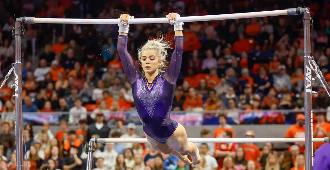 AUBURN, AL - FEBRUARY 10: Olivia Dunne of LSU warms up on the uneven bars during a gymnastics meet against Auburn at Neville Arena on February 10, 2023 in Auburn, Alabama.