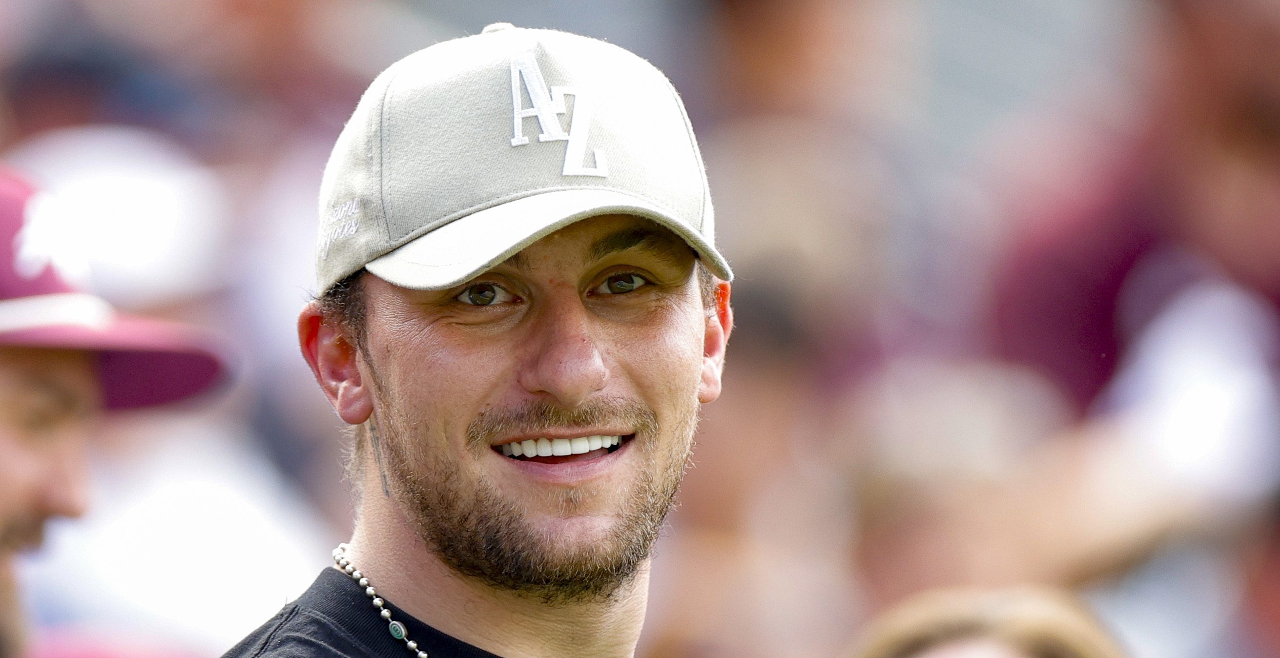 COLLEGE STATION, TEXAS - SEPTEMBER 16: Johnny Manziel looks on during the first half of a game between the Texas A&M Aggies and the Louisiana Monroe Warhawks at Kyle Field on September 16, 2023 in College Station, Texas.