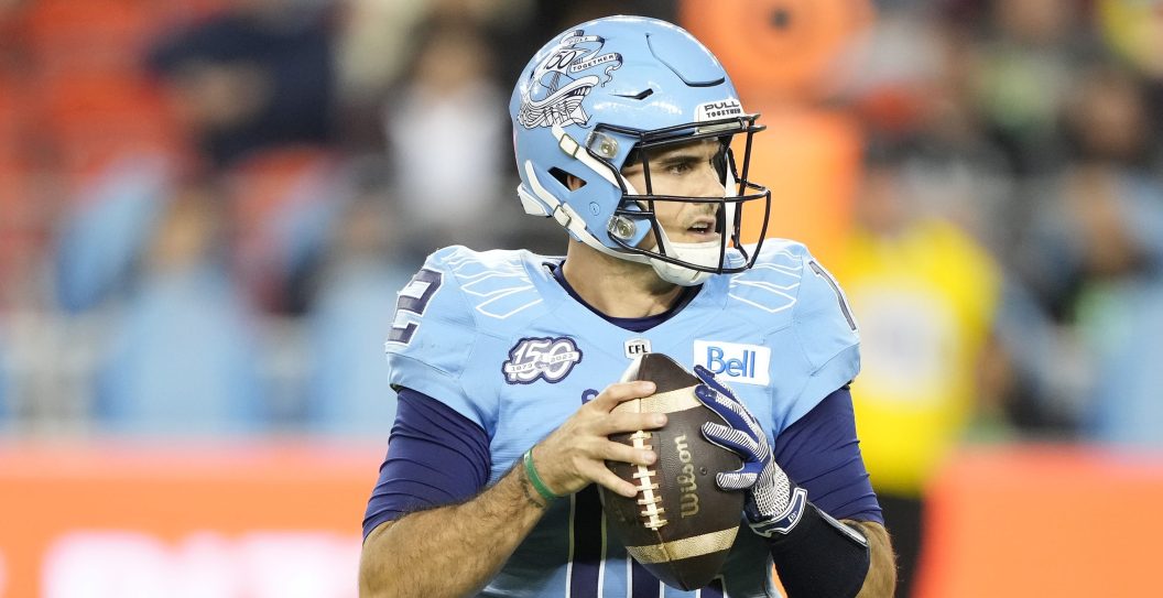 TORONTO, CANADA - OCTOBER 6: Chad Kelly #12 of the Toronto Argonauts sets up to pass against the Edmonton Elks at BMO Field on October 6, 2023 in Toronto, Canada.