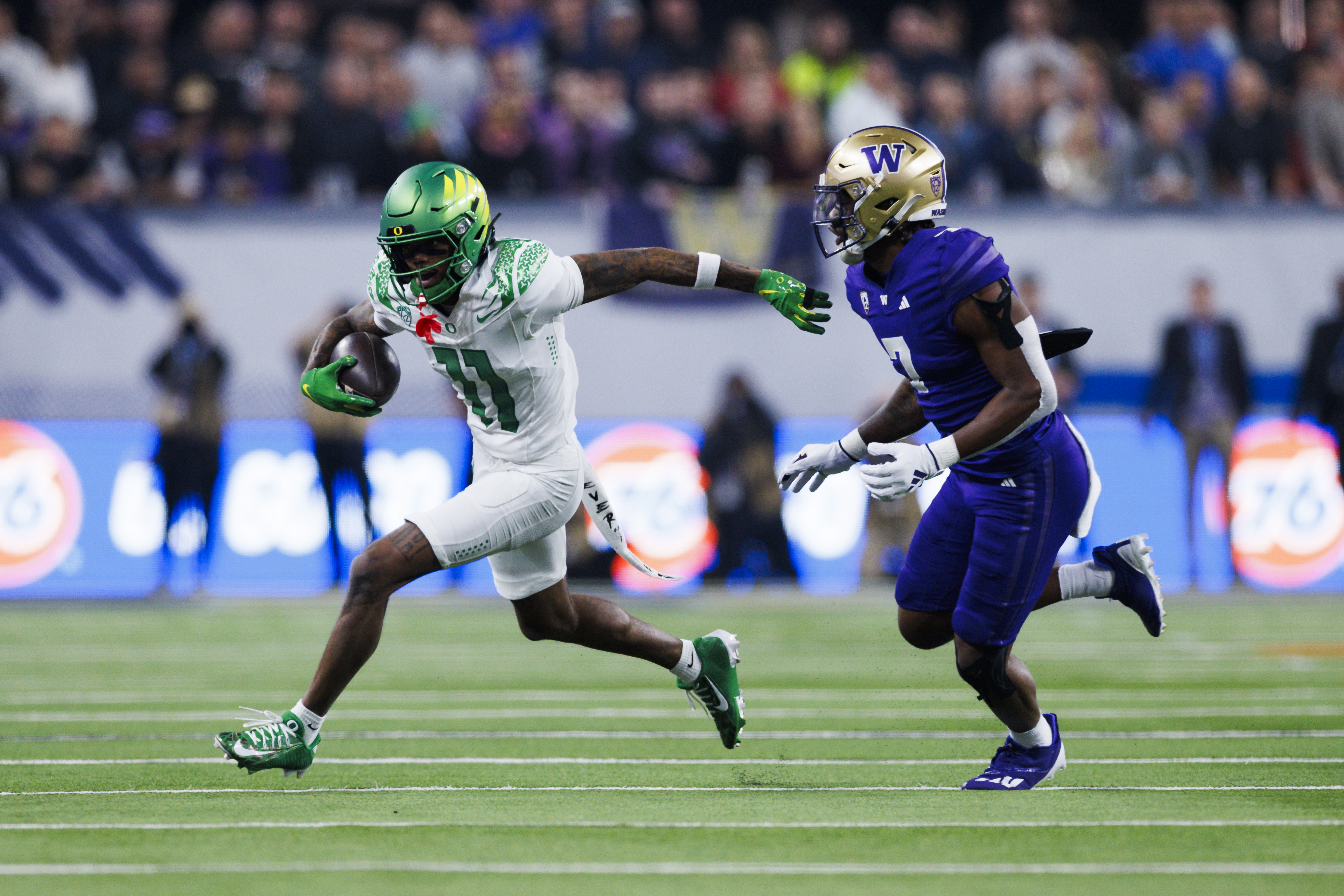 LAS VEGAS, NEVADA - DECEMBER 1: Troy Franklin #11 of the Oregon Ducks runs a route against the Washington Huskies during the Pac-12 Championship at Allegiant Stadium on December 1, 2023 in Las Vegas, Nevada. 