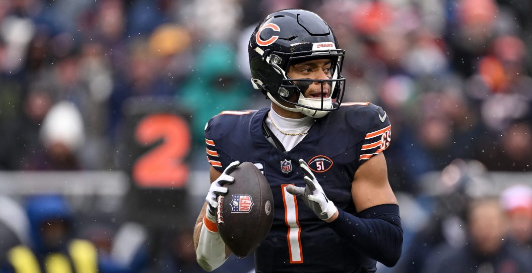 CHICAGO, ILLINOIS - DECEMBER 31: Justin Fields #1 of the Chicago Bears attempts a pass during the second quarter against the Atlanta Falcons at Soldier Field on December 31, 2023 in Chicago, Illinois.