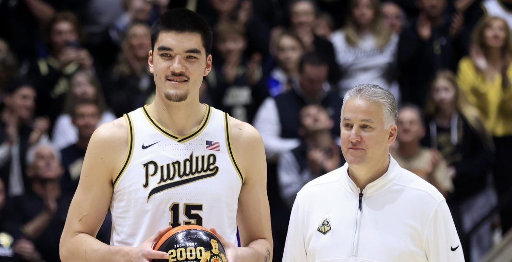 WEST LAFAYETTE, INDIANA - JANUARY 31: Zach Edey #15 of the Purdue Boilermakers, with head coach Matt Painter, is honored for scoring 2,000 career points before the game against the Northwestern Wildcats at Mackey Arena on January 31, 2024 in West Lafayette, Indiana.