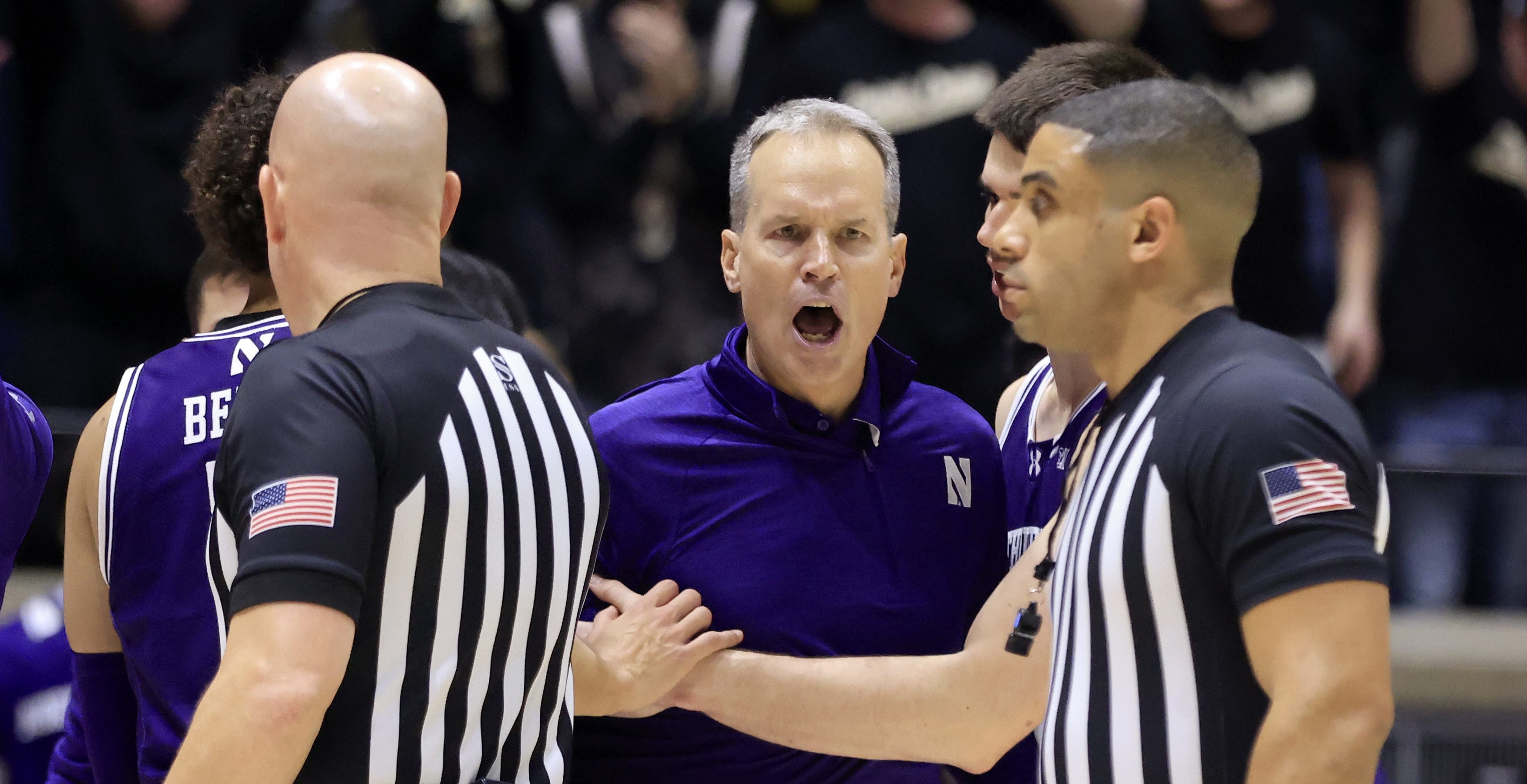 WEST LAFAYETTE, INDIANA - JANUARY 31: Head coach Chris Collins of the Northwestern Wildcats reacts after receiving a technical foul during the second half against the Purdue Boilermakers at Mackey Arena on January 31, 2024 in West Lafayette, Indiana.