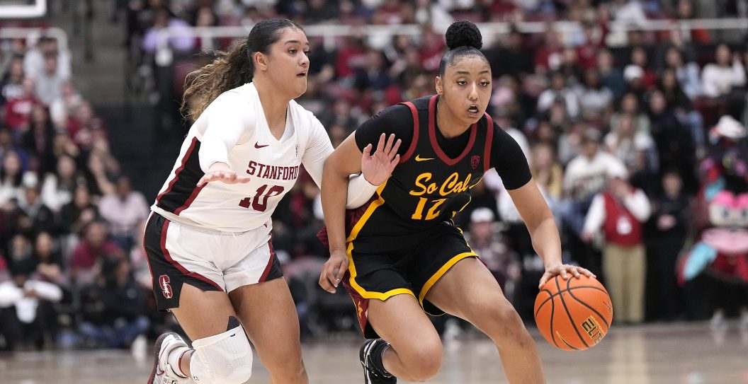 PALO ALTO, CALIFORNIA - FEBRUARY 02: JuJu Watkins #12 of the USC Trojans drives towards the basket past Talana Lepolo #10 of the Stanford Cardinal in the second quarter at Stanford Maples Pavilion on February 02, 2024 in
