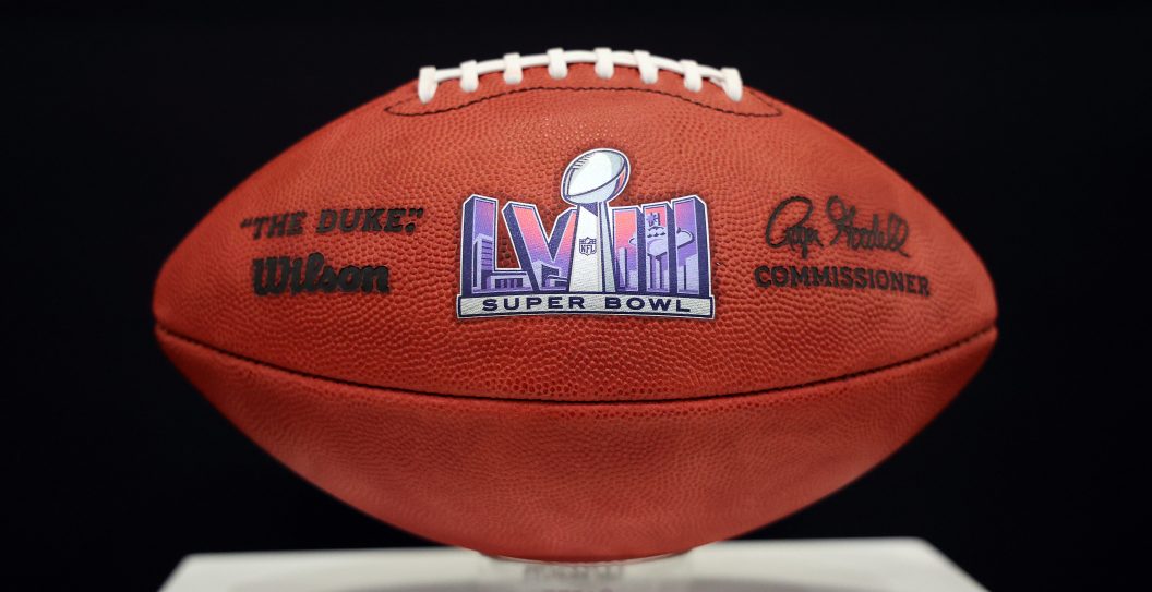 LAS VEGAS, NEVADA - FEBRUARY 06: A general view of official logo footballs displayed in the NFL Super Bowl Experience ahead of Super Bowl LVIII on February 06, 2024 in Las Vegas, Nevada.