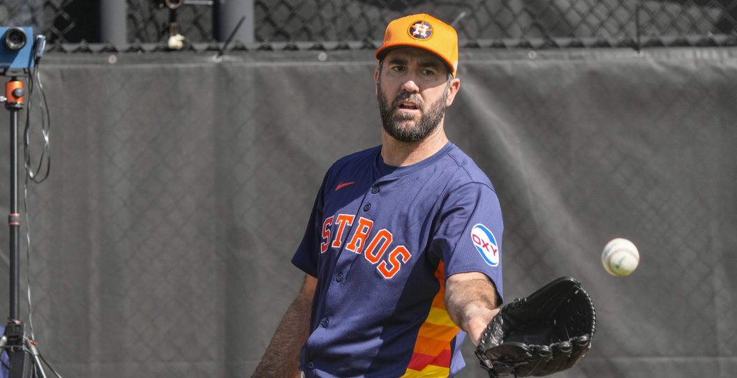 WEST PALM BEACH, FLORIDA - FEBRUARY 15: Houston Astros pitcher Justin Verlander (35) pitches off the 10-pack during workouts for Houston Astros pitchers and catchers at CACTI Park of the Palm Beaches on Thursday, Feb. 15, 2024, in West Palm Beach, Florida.