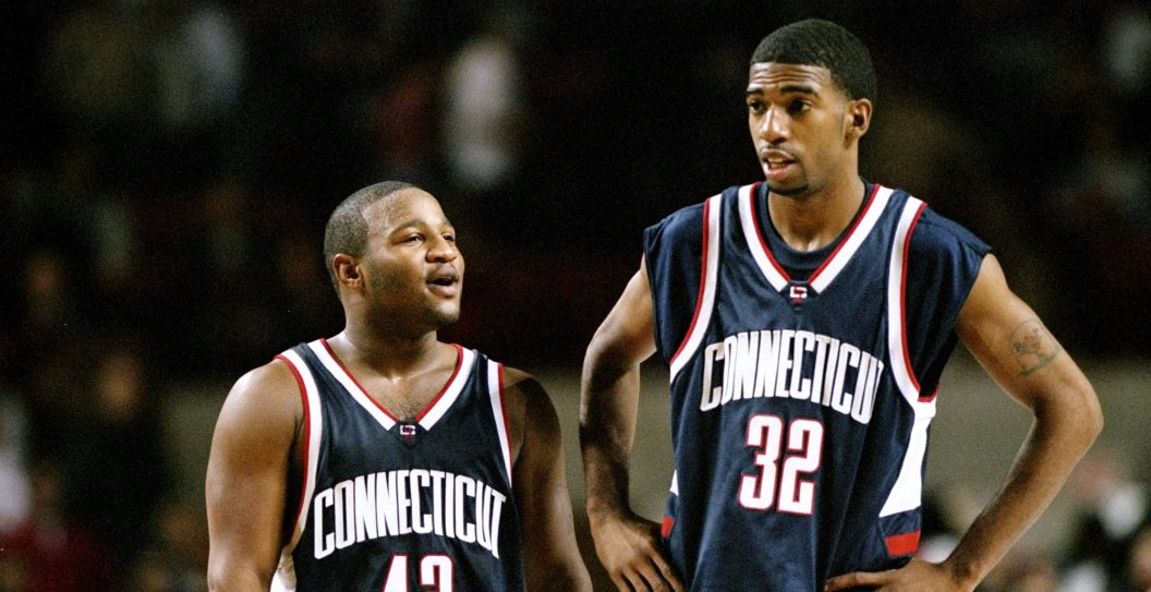 9 Dec 1998: Guard Khalid El-Amin #42 and guard/forward Richard Hamilton #32 of the UConn Huskies confer during the game against the UMass Minutemen at Mullins Center in Amherst, Massachusetts. UConn defeated UMass