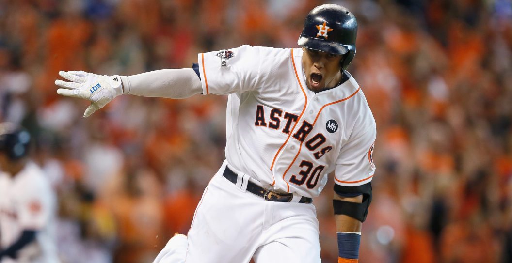 HOUSTON, TX - OCTOBER 11: Carlos Gomez #30 of the Houston Astros reacts after hitting an RBI single in the sixth inning against the Kansas City Royals in game three of the American League Division Series at Minute Maid Park on October 11, 2015 in Houston, Texas.