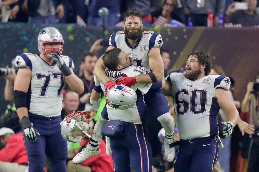 Tom Brady hugs Julian Edelman after winning the Super Bowl.