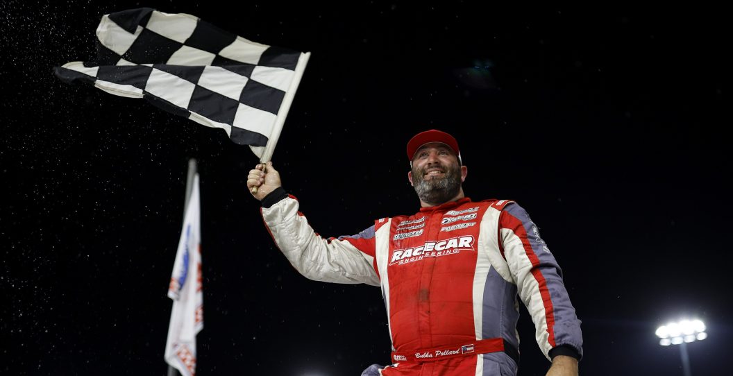 NORTH WILKESBORO, NORTH CAROLINA - MAY 17: Bubba Pollard, driver of the #26b Phoneix Ford, celebrates in victory lane after winning the ASA STARS National Tour ECMD 150 at North Wilkesboro Speedway on May 17, 2023 in North Wilkesboro, North Carolina.