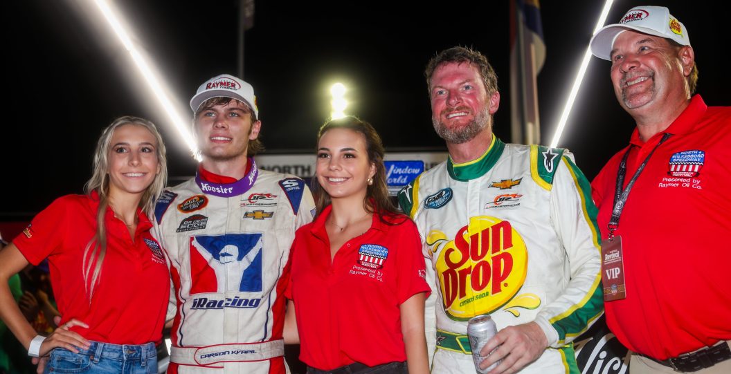 NORTH WILKESBORO, NC - AUGUST 31: Carson Kvapil (8) and Dale Earnhardt Jr. (3) pose for a photo win sponsors after the Cars Tour LMSC 125 on Aug 31, 2022, at the North Wilkesboro Speedway in North Wilkesboro, NC.