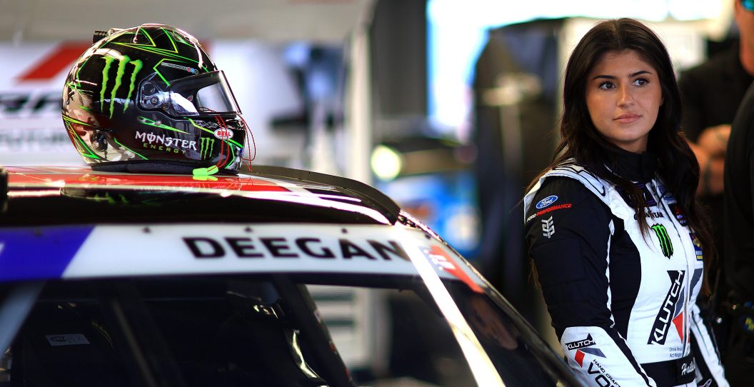 DAYTONA BEACH, FLORIDA - FEBRUARY 16: Hailie Deegan, driver of the #15 Klutch Vodka Ford, looks on in the garage area during qualifying for the NASCAR Craftsman Truck Series Fresh from Florida 250 at Daytona International Speedway on February 16, 2024 in Daytona Beach, Florida.