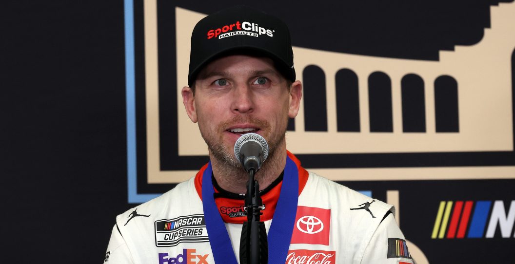 LOS ANGELES, CALIFORNIA - FEBRUARY 03: Denny Hamlin, driver of the #11 Sport Clips Haircuts Toyota, speaks to the media after winning the NASCAR Cup Series Busch Light Clash at The Coliseum at Los Angeles Memorial Coliseum on February 03, 2024 in Los Angeles, California.