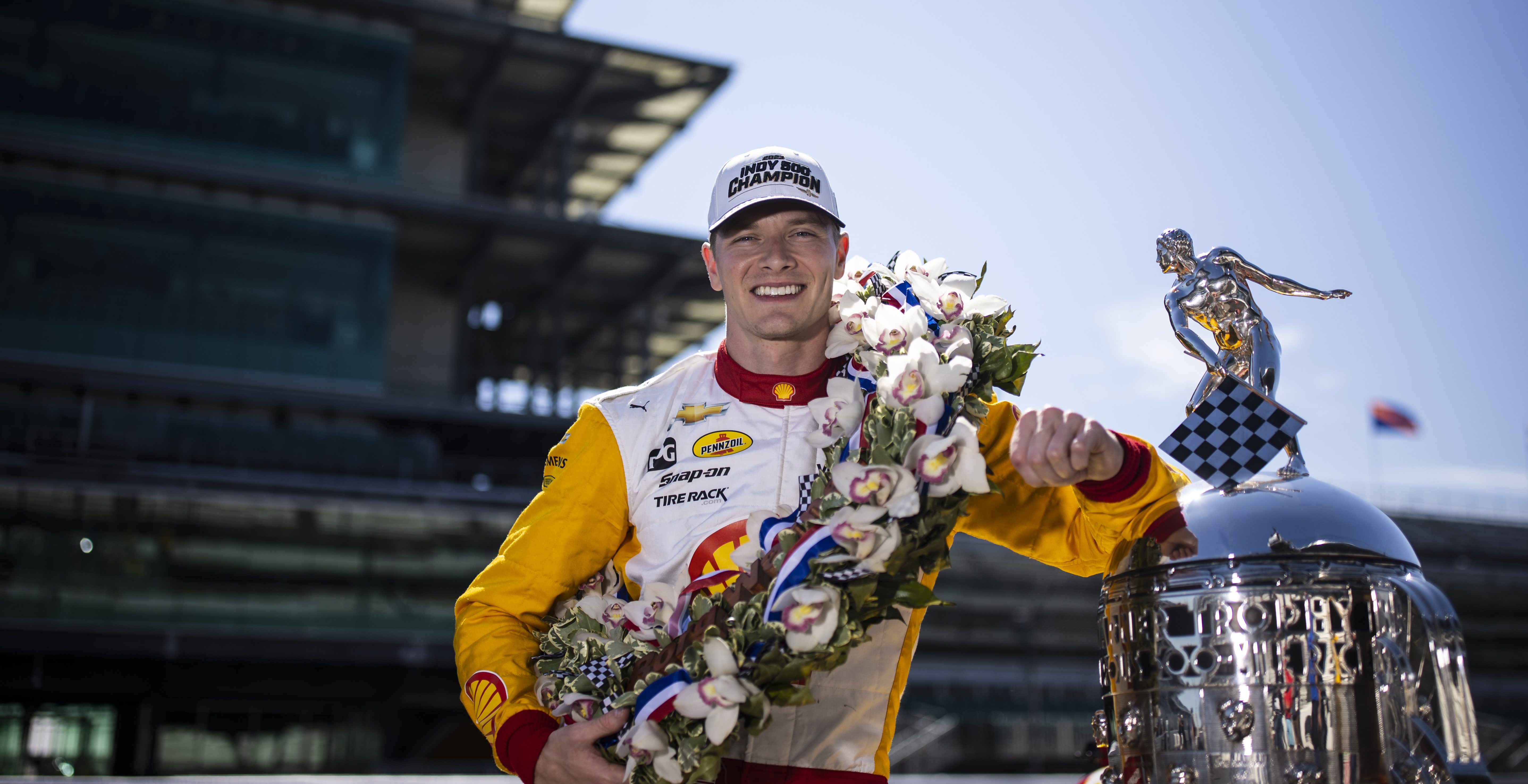 INDIANAPOLIS, INDIANA - MAY 29: Josef Newgarden, driver of the #2 PPG Team Penske Chevrolet, poses for a photo during the 107th Indianapolis 500 champion's portraits at Indianapolis Motor Speedway on May 29, 2023 in Indianapolis, Indiana.