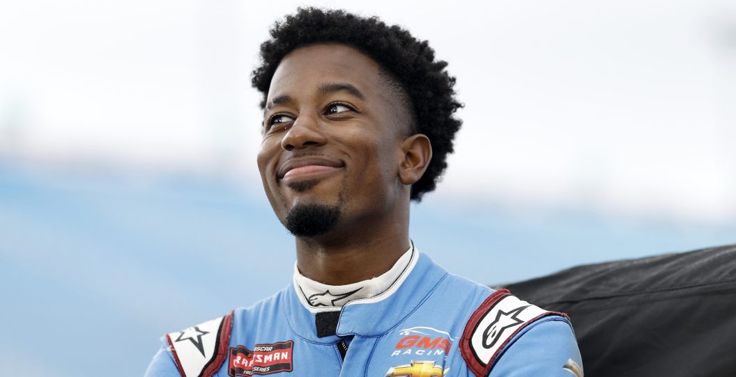 HOMESTEAD, FLORIDA - OCTOBER 20: Rajah Caruth, driver of the #24 Wendell Scott Foundation Chevrolet, waits on the grid during practice for the NASCAR Craftsman Truck Series Baptist Health Cancer Care 200 at Homestead-Miami Speedway on October 20, 2023 in Homestead, Florida.