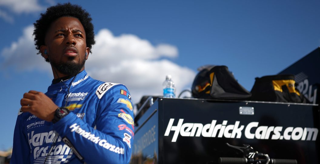 HAMPTON, GEORGIA - FEBRUARY 23: Rajah Caruth, driver of the #71 HendrickCars.com Chevrolet, looks on during qualifying for the NASCAR Craftsman Truck Series Fr8 208 at Atlanta Motor Speedway on February 23, 2024 in Hampton, Georgia.