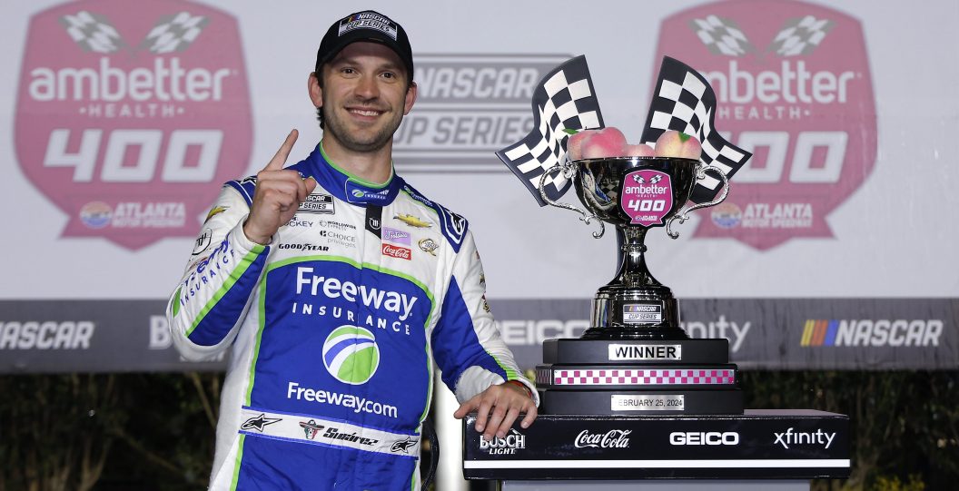 HAMPTON, GEORGIA - FEBRUARY 25: Daniel Suarez, driver of the #99 Freeway Insurance Chevrolet, celebrates in victory lane after winning the NASCAR Cup Series Ambetter Health 400 at Atlanta Motor Speedway on February 25, 2024 in Hampton, Georgia.