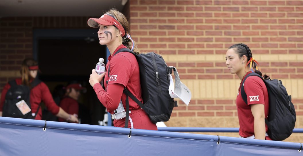 OKLAHOMA CITY, OK - JUNE 08: Jordy Bahl #98 of the Oklahoma Sooners arrives with teammates before the Division I Womens Softball Championship against the Florida State Seminoles held at USA Softball Hall of Fame Stadium on June 7, 2023 in Oklahoma City, Oklahoma.