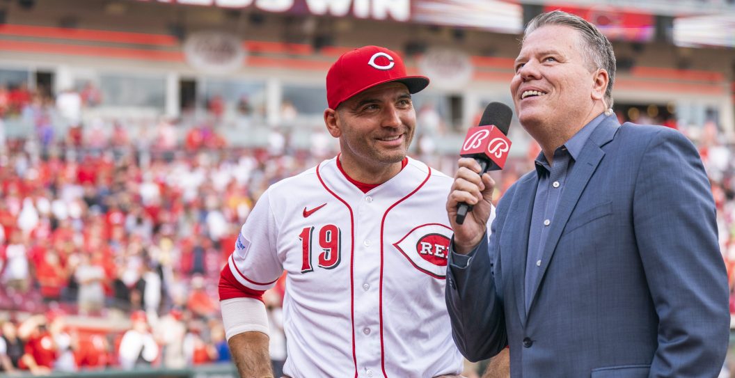 CINCINNATI, OHIO - SEPTEMBER 24: Joey Votto #19 of the Cincinnati Reds does a post-game interview with Jim Day after a game against the Pittsburgh Pirates at Great American Ball Park on September 24, 2023 in Cincinnati, Ohio.