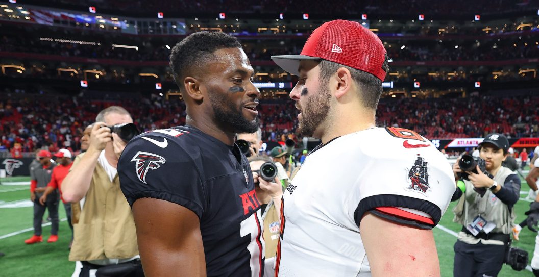 ATLANTA, GEORGIA - DECEMBER 10: Baker Mayfield #6 of the Tampa Bay Buccaneers reacts with Desmond Ridder #9 of the Atlanta Falcons after the game at Mercedes-Benz Stadium on December 10, 2023 in Atlanta, Georgia.