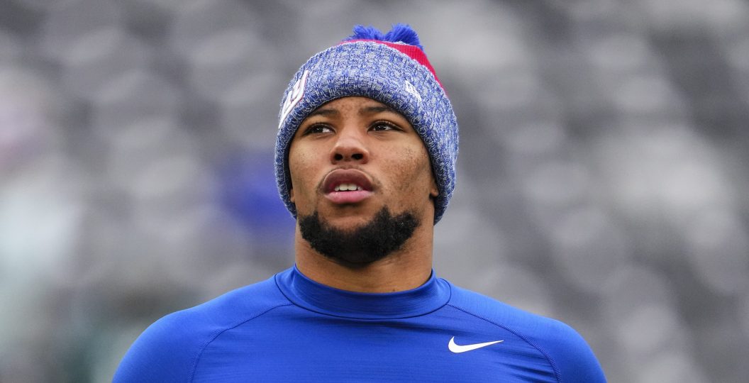 EAST RUTHERFORD, NJ - JANUARY 07: Saquon Barkley #26 of the New York Giants warms up prior to an NFL football game against the Philadelphia Eagles at MetLife Stadium on January 7, 2024 in East Rutherford, New Jersey