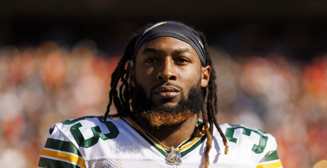 DENVER, COLORADO - OCTOBER 22: Aaron Jones #33 of the Green Bay Packers looks on from the sideline before an NFL football game against the Denver Broncos at Empower Field At Mile High on October 22, 2023 in Denver, Colorado.